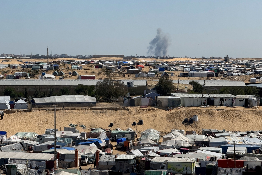 Smoke rises during an Israeli ground operation in Khan Younis, amid the ongoing conflict between Israel and the Palestinian Islamist group Hamas, as seen from a tent camp sheltering displaced Palestinians in Rafah, in the southern Gaza Strip March 11, 2024. — Reuters pic