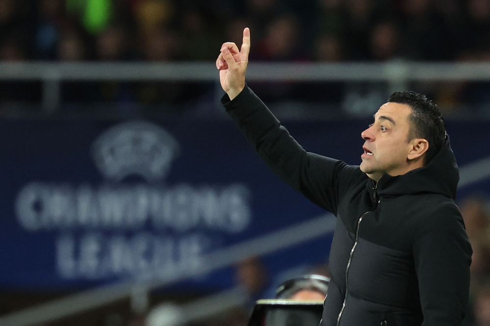 Barcelona's Spanish coach Xavi gestures during the Uefa Champions League last 16 second leg football match between FC Barcelona and SSC Napoli at the Estadi Olimpic Lluis Companys in Barcelona on March 12, 2024. — AFP pic