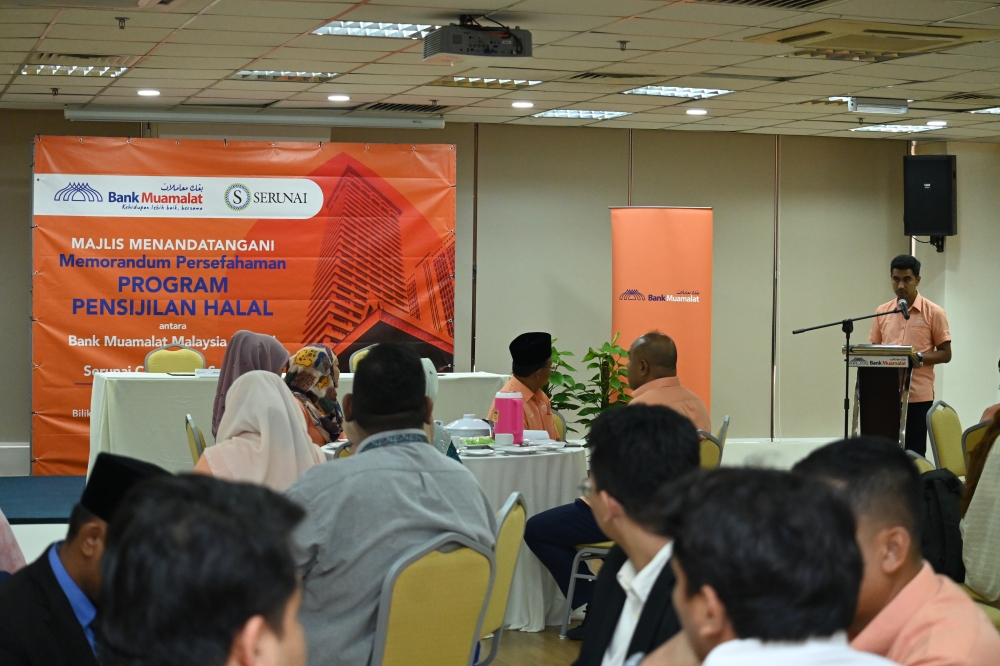 Bank Muamalat Chief Financial Officer Amirul Nasir Abdul Rahim speaks at the signing ceremony of the Memorandum of Understanding ]for the Halal Certification Programme between Bank Muamalat and Serunai Commerce Sdn Bhd at Menara Bumiputra March 13, 2024. — Bernama pic