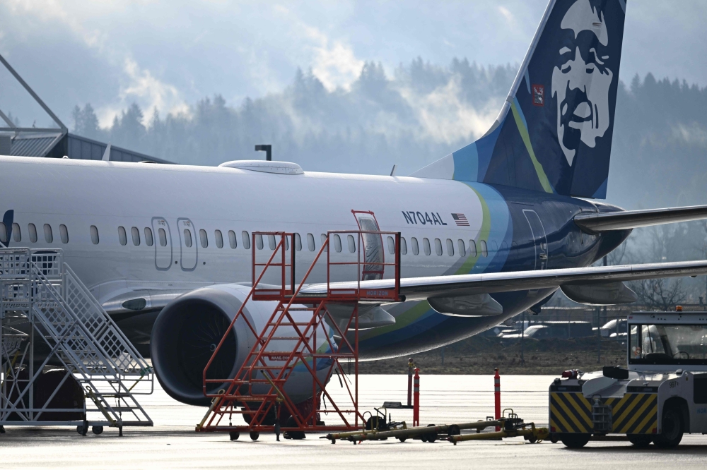 Aviation giant Boeing has been unable to produce key information about work performed on an Alaska Airlines plane before a January mid-air scare, the National Transportation Safety Board (NTSB) chair said yesterday. — AFP pic