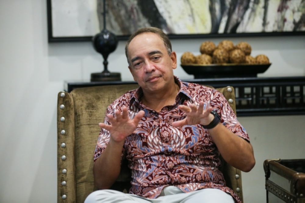Tan Sri Nazir Razak said children should not be punished for the irresponsibility of parents or circumstances. — Picture by Ahmad Zamzahuri