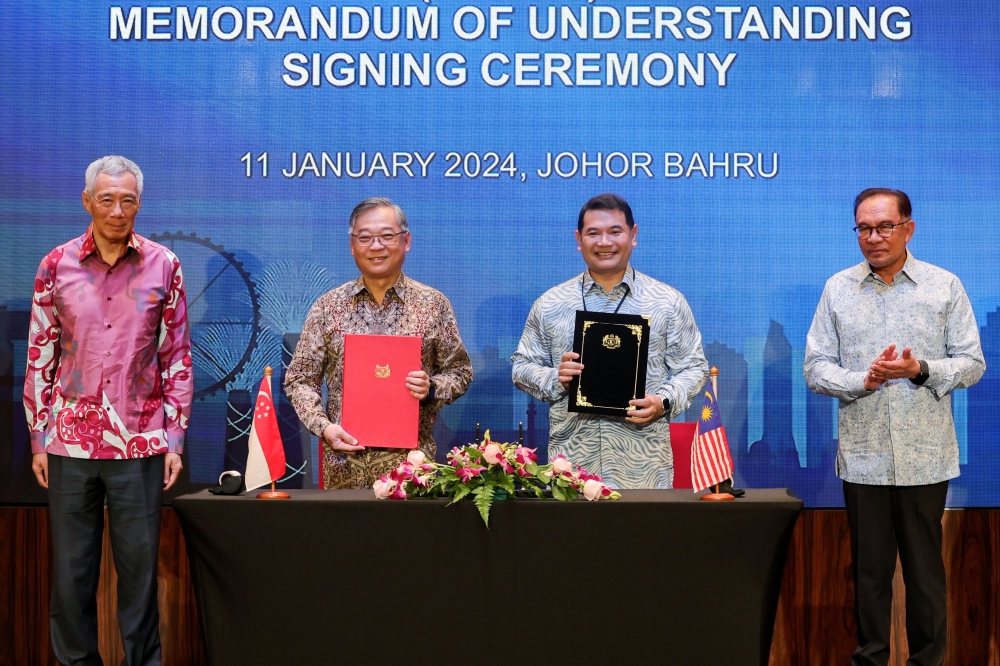 The memorandum of understanding to work on the JS-SEZ in Johor was signed by Economy Minister Rafizi Ramli with Singapore’s Trade and Industry Minister Gan Kim Yong on January 11, 2024, in Johor Baru, witnessed by the two countries’ prime ministers, in this file picture. — Bernama pic