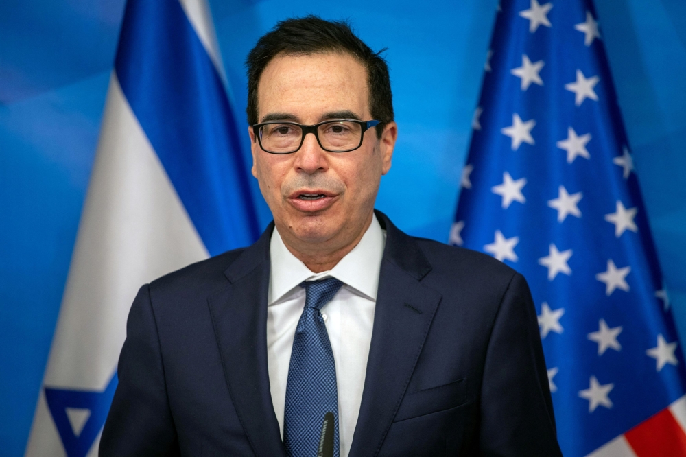 Steven Mnuchin is looking for investors to purchase TikTok. — Reuters pic