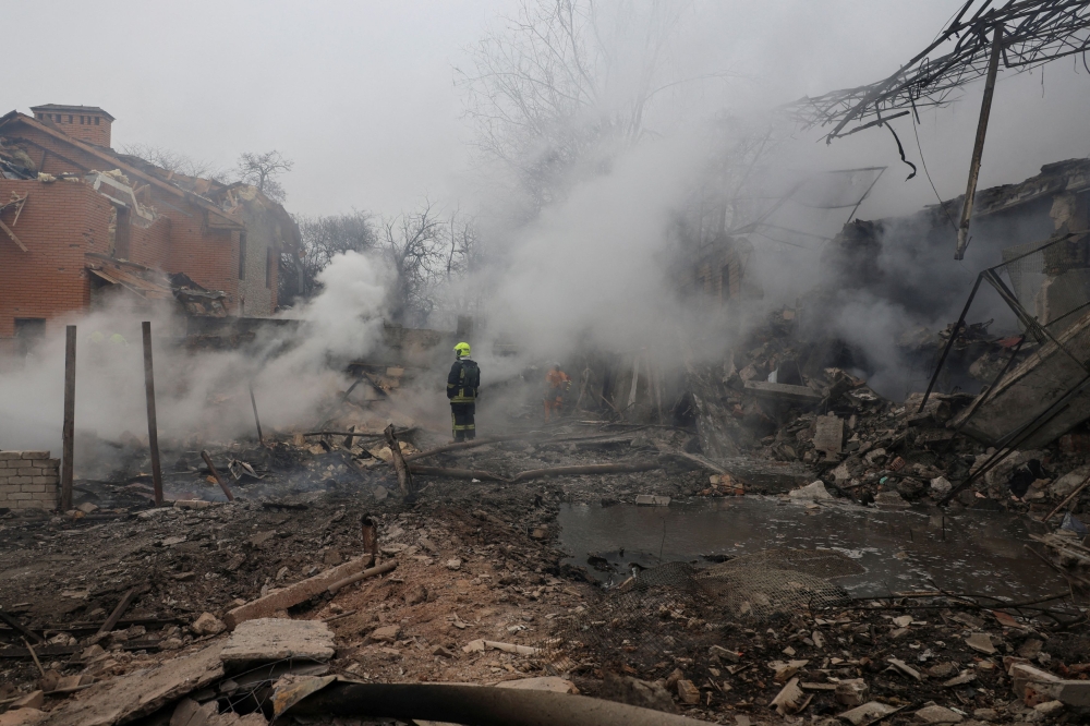 A rescuer stands in a residential area hit by a Russian missile strike, amid Russia’s attack on Ukraine, in Odesa, Ukraine March 15, 2024. — Reuters pic