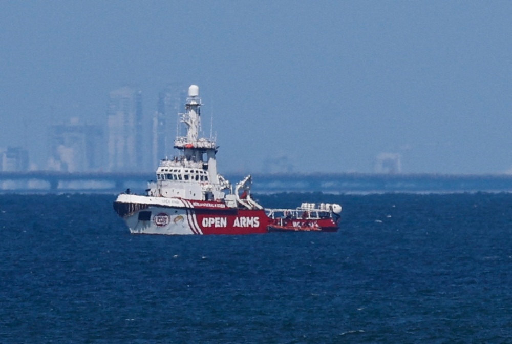 The Open Arms vessel carrying aid sails off the shore of Gaza, amid the ongoing conflict between Israel and the Palestinian Islamist group Hamas, as seen from central Gaza Strip, March 15, 2024. — Reuters pic
