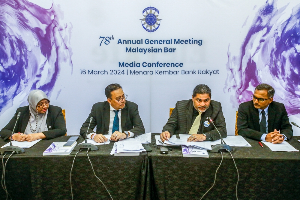 A new Malaysian Bar President for 2024 and 2025 Mohamed Ezri Abdul Wahab (second left) and Vice President Anand Raj Balasupramaniam (second right) at the press conference during the Malaysian Bar AGM at KL Sentral March 16, 2024. — Picture by Hari Anggara.