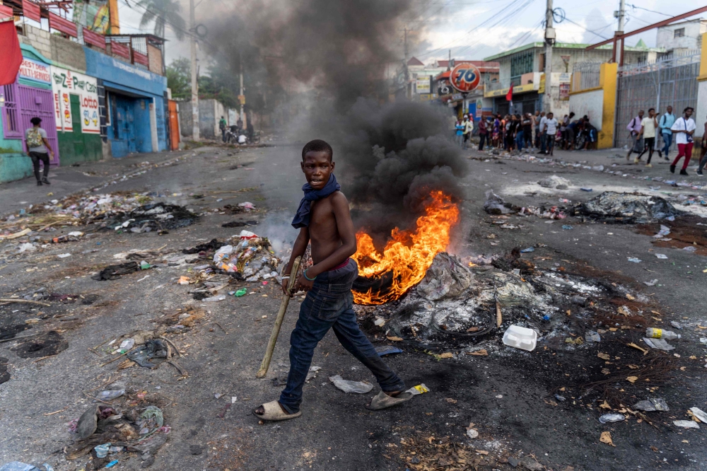 The UN children’s agency chief offered a dire assessment yesterday of the chaotic situation in Haiti, saying it was ‘almost like a scene out of Mad Max’, which depicted a violent and lawless post-apocalyptic future. — AFP pic 