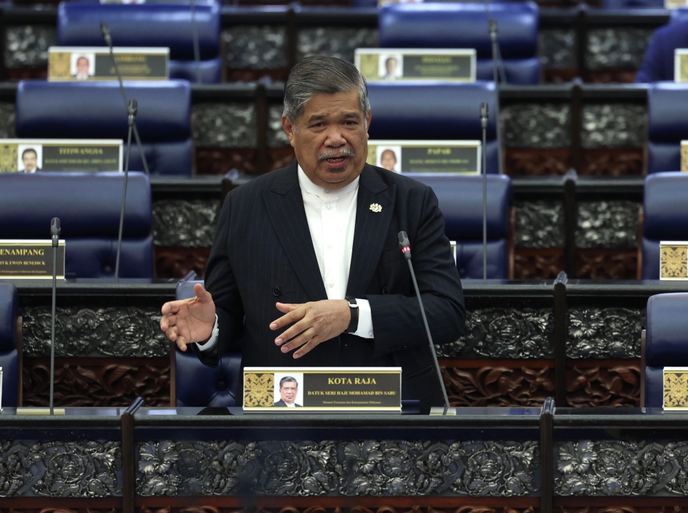 Agriculture and Food Security Minister Datuk Seri Mohamad Sabu speaks at the Parliament in Kuala Lumpur March 19, 2024. — Bernama pic