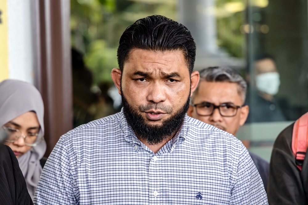 Minister in the Prime Minister’s Department (Religious Affairs), Datuk Mohd Na’im Mokhtar, will file an application for a default judgment against blogger Wan Muhammad Azri Wan Deris (pic), popularly known as Papagomo. — Picture by Firdaus Latif   