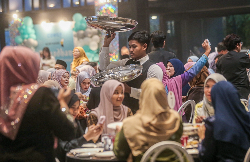 Guests enjoying a 'buka puasa' dinner at Galasa Caldwell on Jalan Raja Dihilir in Ipoh.