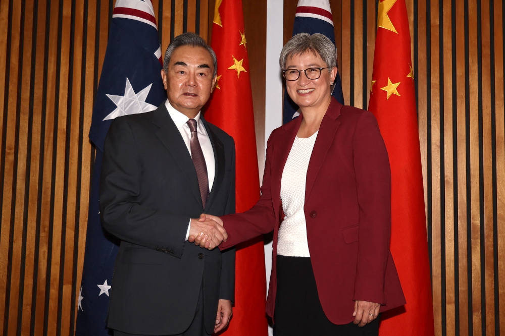 China’s Foreign Minister Wang Yi in capital Canberra for high-level talks with counterpart Penny Wong, returning to Australia for the first time since 2017. — AFP pic