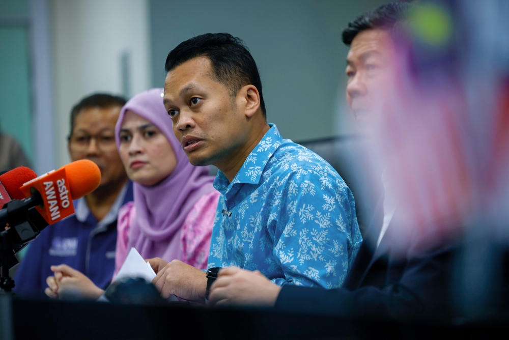 Natural Resources and Environmental Sustainability Minister Nik Nazmi Nik Ahmad speaks to reporters after witnessing the Memorandum of Agreement (MoA) Signing Ceremony between Universiti Teknikal Malaysia Melaka (UTeM) and Megatrex Plastic Industries Sdn Bhd in Melaka March 20, 2024. — Bernama pic