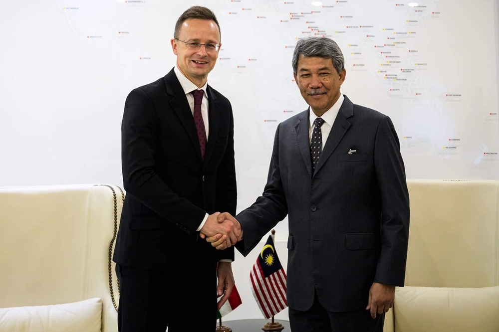 (From left) Hungarian Foreign Affairs and Trade Minister Peter Szijjártó and Malaysian Foreign Minister Datuk Seri Mohamad Hasan discussed efforts to strengthen ties particularly in trade and investment, agriculture, and cooperation in electro-mobility during a bilateral meeting. — Picture via Facebook/Szijjártó Péter