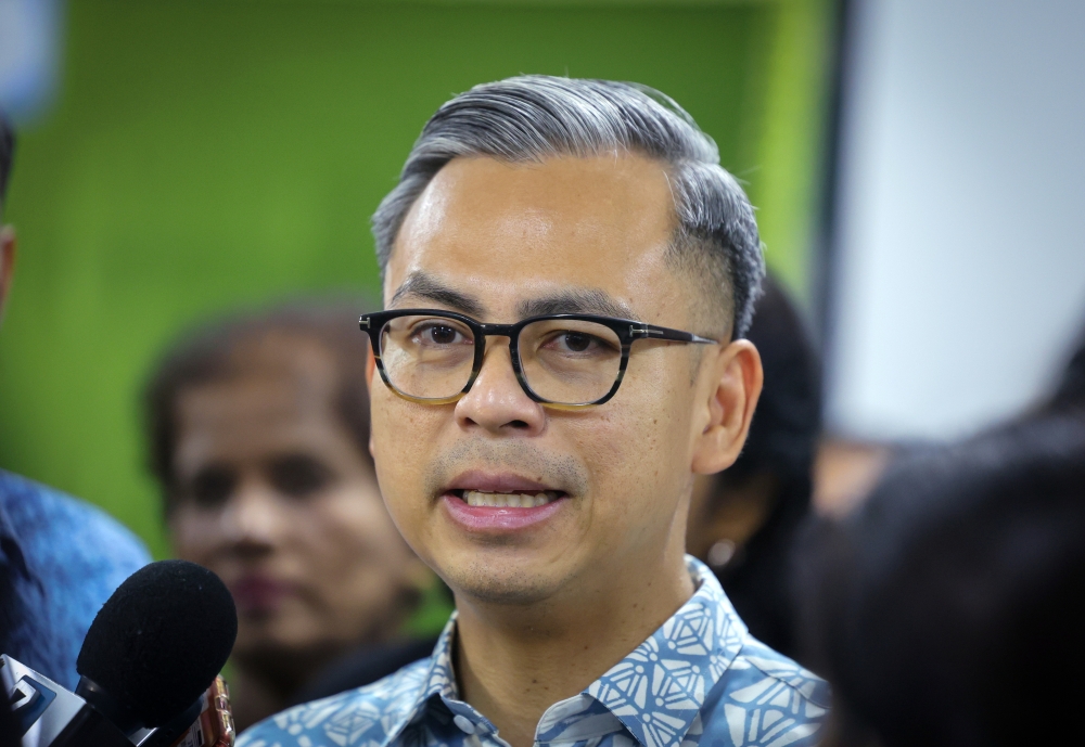 Communications Minister Fahmi Fadzil speaks to reporters after the Device Donation Programme at Sekolah Jenis Kebangsaan Tamil (SJKT) Saraswathy in Kuala Lumpur March 21, 2024. ― Bernama pic