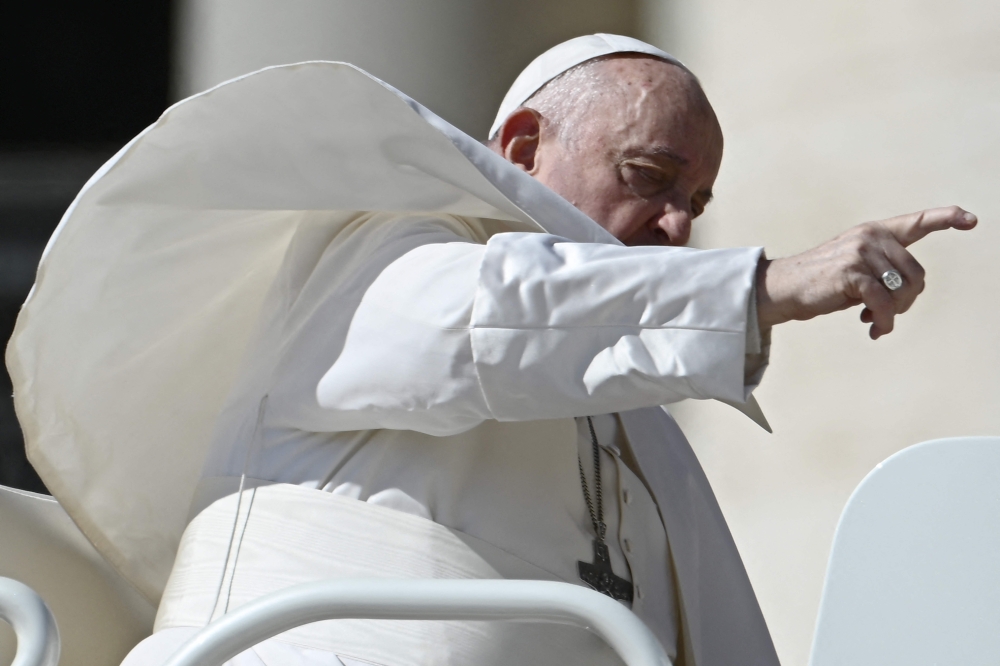 Pope Francis gestures at the end of the weekly general audience on March 20, 2024 at St Peter's square in The Vatican. — AFP pic