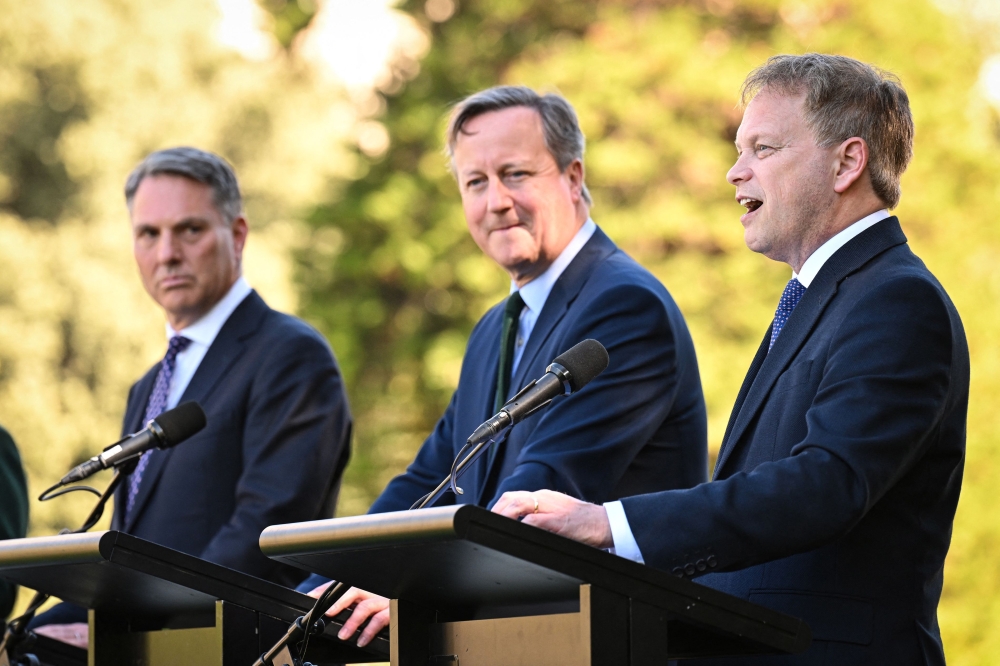 (from left) Australia's Deputy Prime Minister and Defence Minister Richard Marles, Britain's Foreign Secretary David Cameron, and Britain's Secretary of State for Defence Grant Shapps hold a media conference at Government House in Adelaide, South Australia, on March 22, 2024, as part of the annual Australia-United Kingdom Ministerial Consultations (Aukmin). — AFP pic