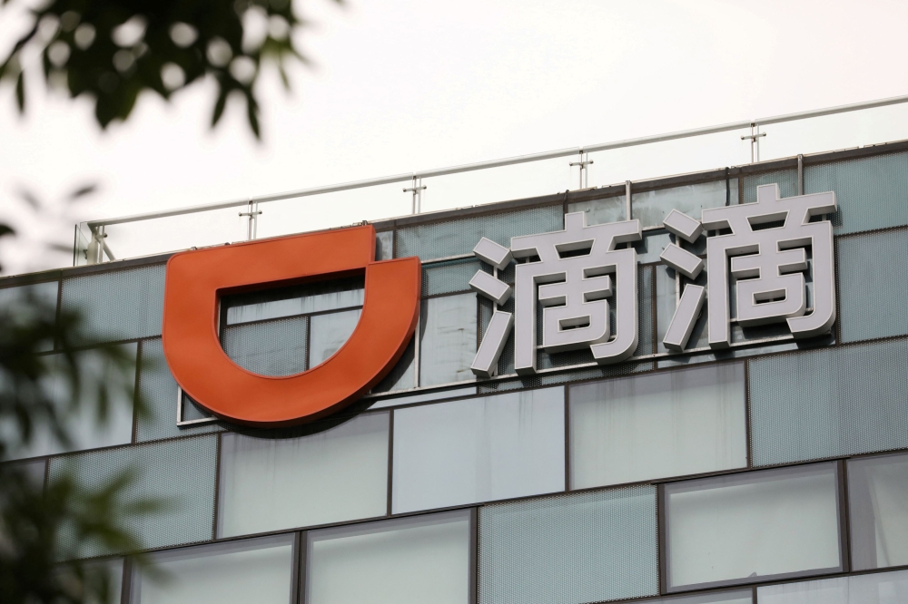 Didi Global reported net income attributable to shareholders of 818 million yuan (RM536 million) in the three months ending December 31, compared with a loss of 953 million yuan a year ago. — Reuters pic