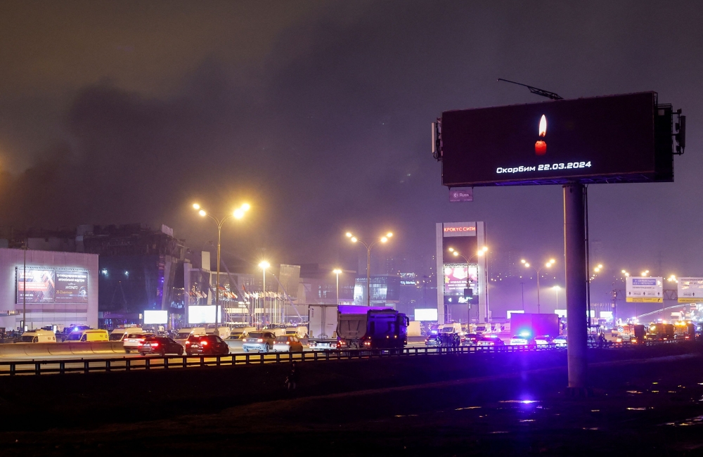 A digital board with a date and a slogan, that reads 