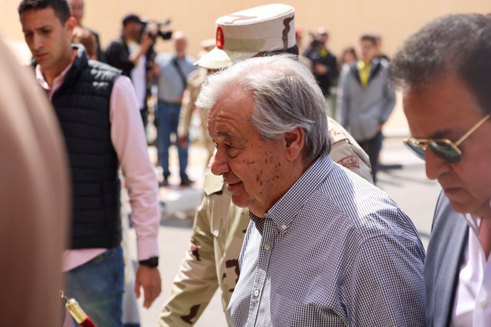 United Nations Secretary-General Antonio Guterres walks at Al Arish airport, amid the ongoing conflict between Israel and the Palestinian Islamist group Hamas, in Egypt March 23, 2024. — Reuters pic