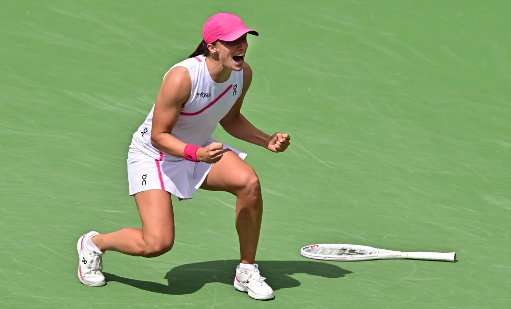 File photo of Poland’s Iga Swiatek reacting after winning match point against Greece’s Maria Sakkari during the ATP-WTA Indian Wells Masters women’s final tennis match at the Indian Wells Tennis Garden in Indian Wells, California, on March 17, 2024. — AFP pic