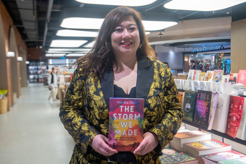 Vanessa Chan with her debut novel ‘The Storm We Made.’ — Picture by Shafwan Zaidon