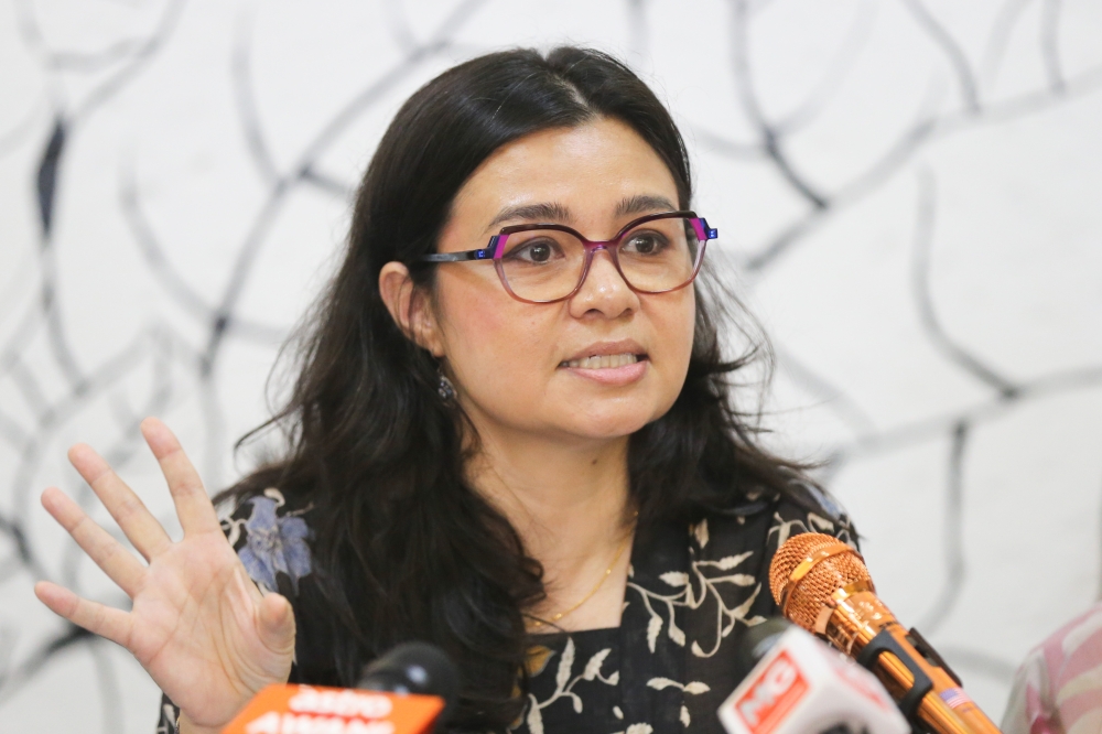 Suriani Kempe speaks during MCRA press conference on 3 remaining Citizenship Amendments at Chow Kit on March 24, 2024. —Picture by Miera Zulyana