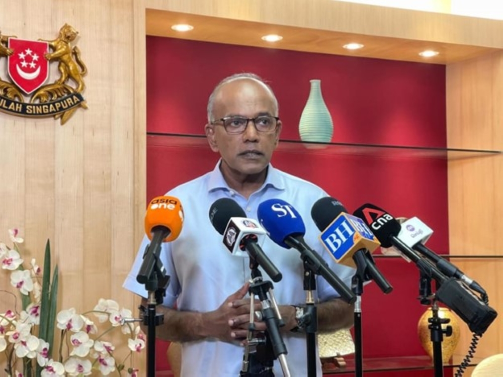 Law and Home Affairs Minister K Shanmugam speaking to reporters today about a Facebook post by the Israeli embassy in Singapore, which local authorities asked to be taken down. — TODAY pic