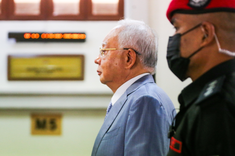 Former prime minister Datuk Seri Najib Razak arrives for the SRC International  trial at Kuala Lumpur High Court, March 25, 2024. — Picture by Miera Zulyana