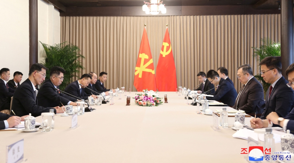 North Korea’s Kim Song Nam, alternate member of the Political Bureau and director of the International Department of the party’s Central Committee, and Liu Jianchao, who leads the Chinese Communist Party’s body in charge of managing ties with foreign political parties, meet in Beijing, China March 21, 2024 in this photo released on March 23, 2024. Liu will be making an official visit to Singapore from March 25-28. — KCNA via Reuters pic