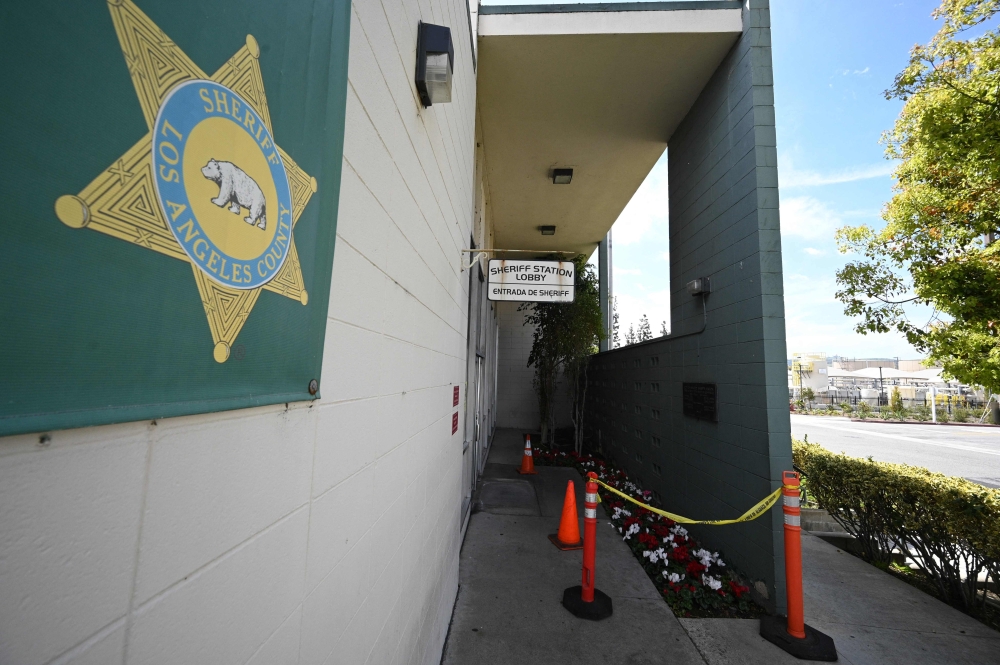 A teenage girl shot herself dead with a deputy’s gun in the lobby of a sheriff’s station in California, authorities said yesterday. — AFP pic