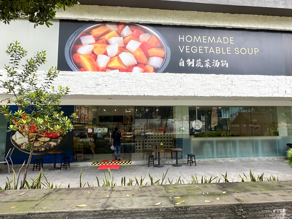 Madam Fish Noodle House's signage is not above the eatery but you can see it when you drive past Mont Kiara Meridin.