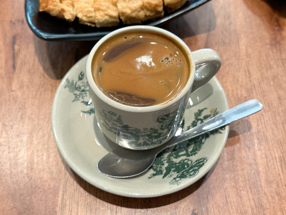 Add on a cup of Claypot Kopi with your bowl of noodles for a robust cup of java.