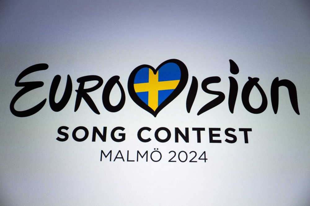 This photograph taken on February 20, 2024 shows the logo of the Eurovision 2024 displayed during a press conference of Belgian singer actor and singer Mustii (aka Thomas Mustin), who will represent Belgium at the song contest, at the headquarters of French-spoken public broadcaster RTBF in Brussels. The contest will be held in Malmo, Sweden, in May. — AFP pic