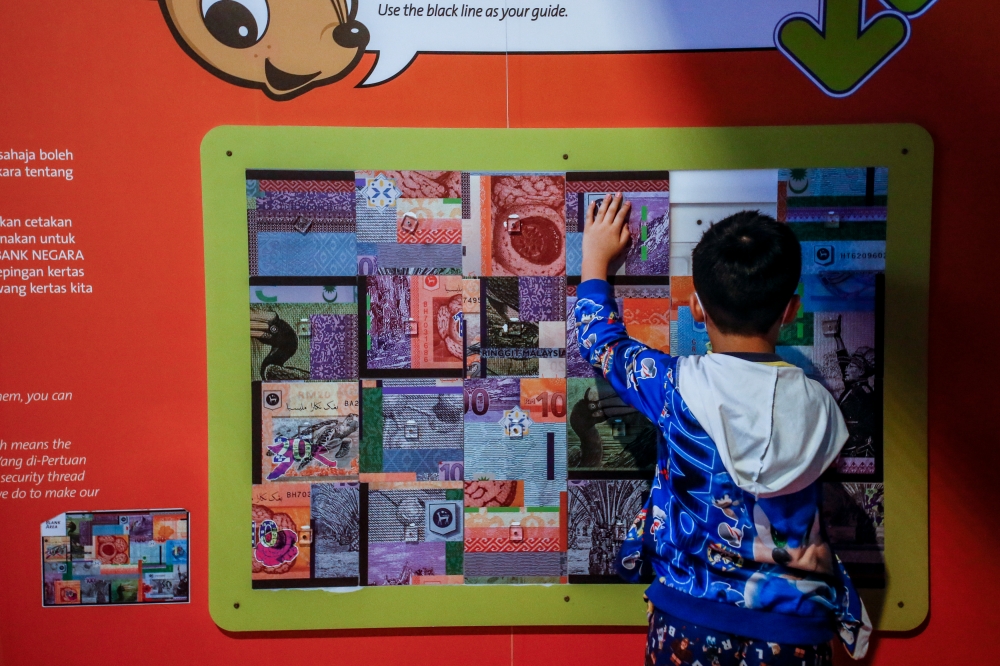 The Children’s Gallery is filled with hands-on games and activities based on the concept of ‘Save, Spend and Share’, a unique informal learning venue for elementary and primary school kids. — Picture by Hari Anggara