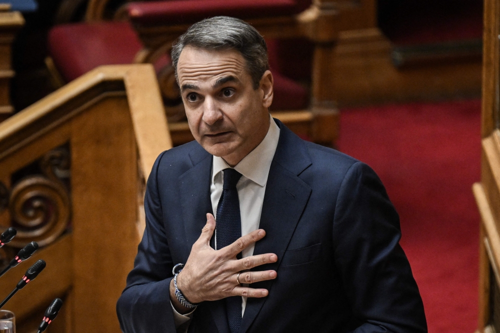 Greek Prime Minister Kyriakos Mitsotakis addresses lawmakers at parliament, ahead of a vote on confidence following a motion of censure submitted by leftist and centre-left opposition parties, in Athens on March 28, 2024. — AFP pic