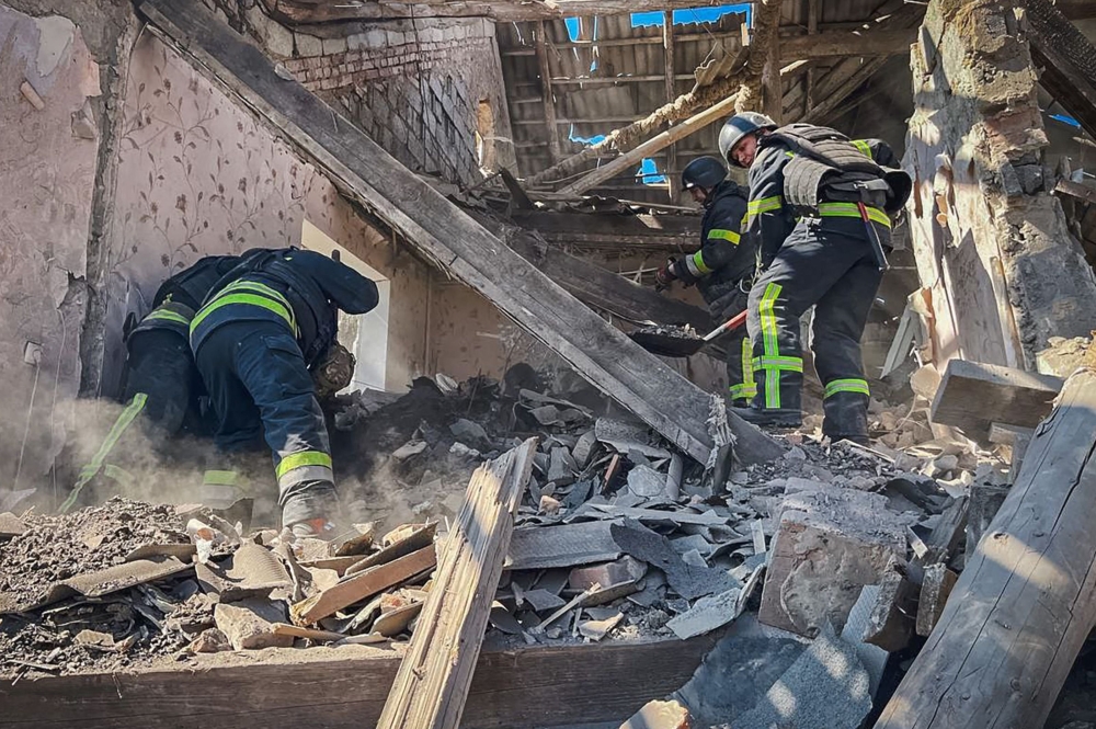 This handout photograph taken and released by Ukrainian Emergency Service on March 28, 2024, shows rescuers working at the site of a missile attack in Mykolaivka, Donetsk region, amid the Russian invasion of Ukraine. — Ukrainian Emergency Service/AFP pic