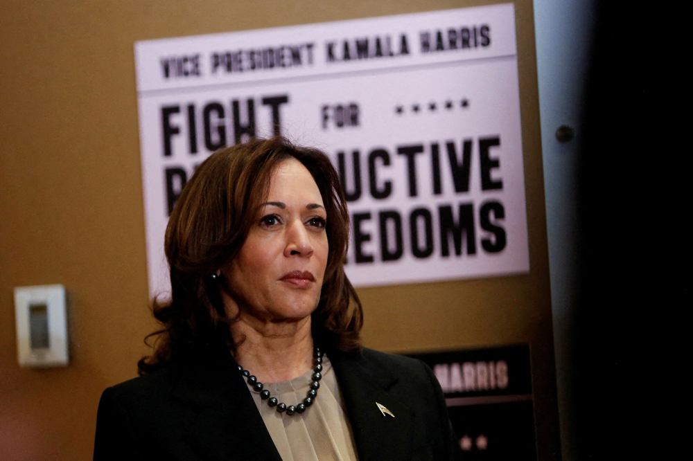 US Vice President Kamala Harris looks on during a visit to the St. Paul Health Center, a clinic that performs abortions, in St. Paul, Minnesota March 14, 2024. — Reuters pic  