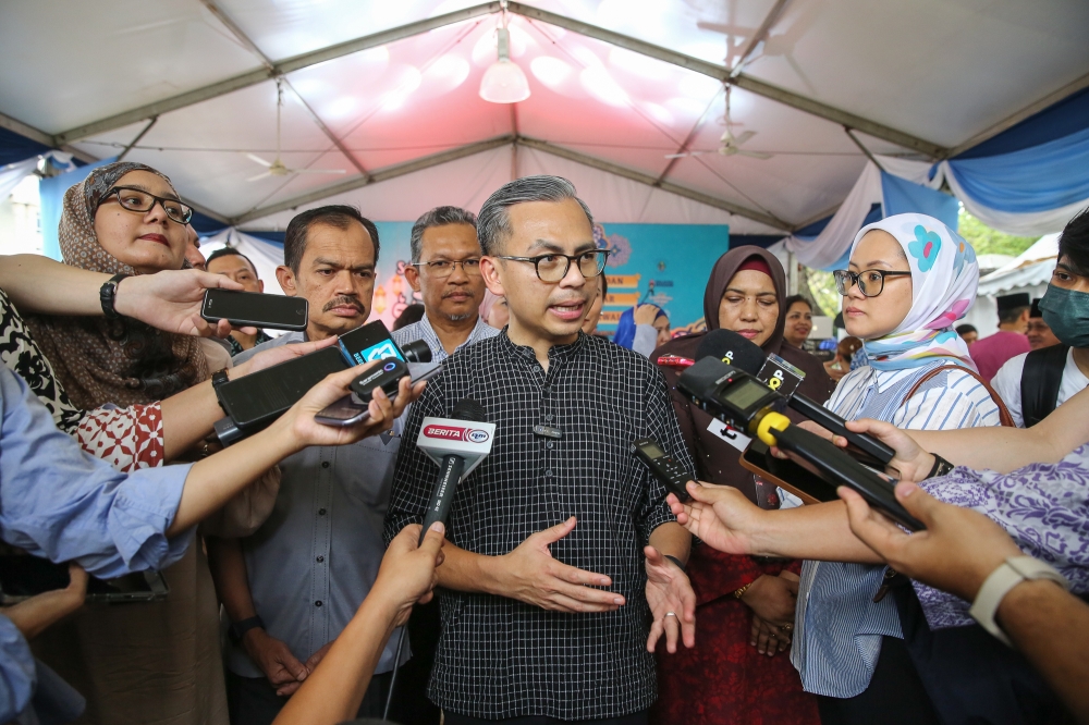 Communications Minister Fahmi Fadzil said the government is seeking to implement some similar aspects of Thailand’s concert tax break policy in Malaysia. — Picture by Yusof Mat Isa