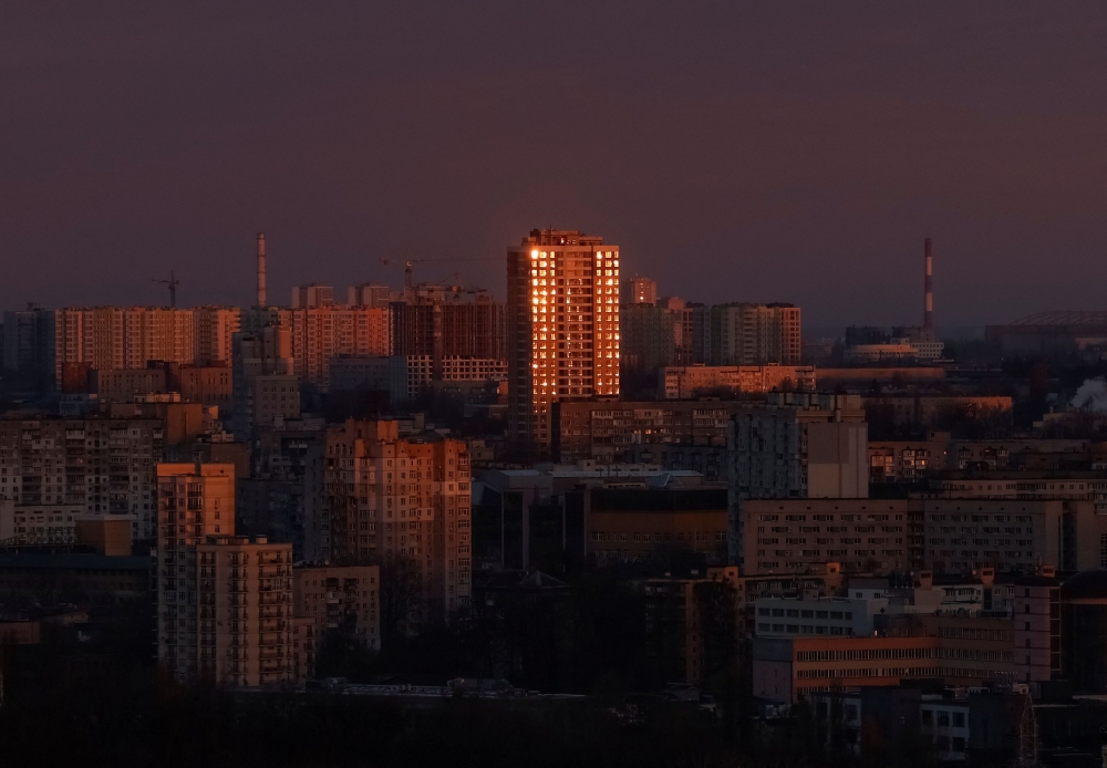 A view of the city at sunrise during an air raid alert, amid Russia's attack on Ukraine, in Kyiv March 29, 2024. — Reuters pic  