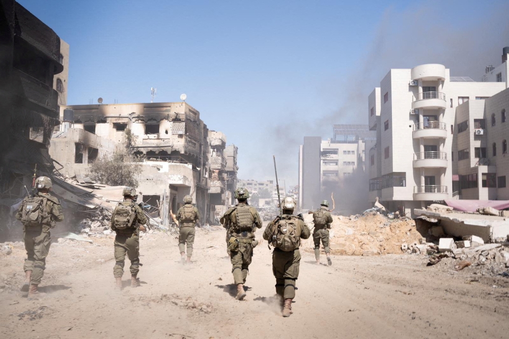 Israeli soldiers operate in the Gaza Strip amid the ongoing conflict between Israel and the Palestinian Islamist group Hamas, in this handout picture released March 27, 2024. — Picture by Israel Defense Forces/Handout via Reuters