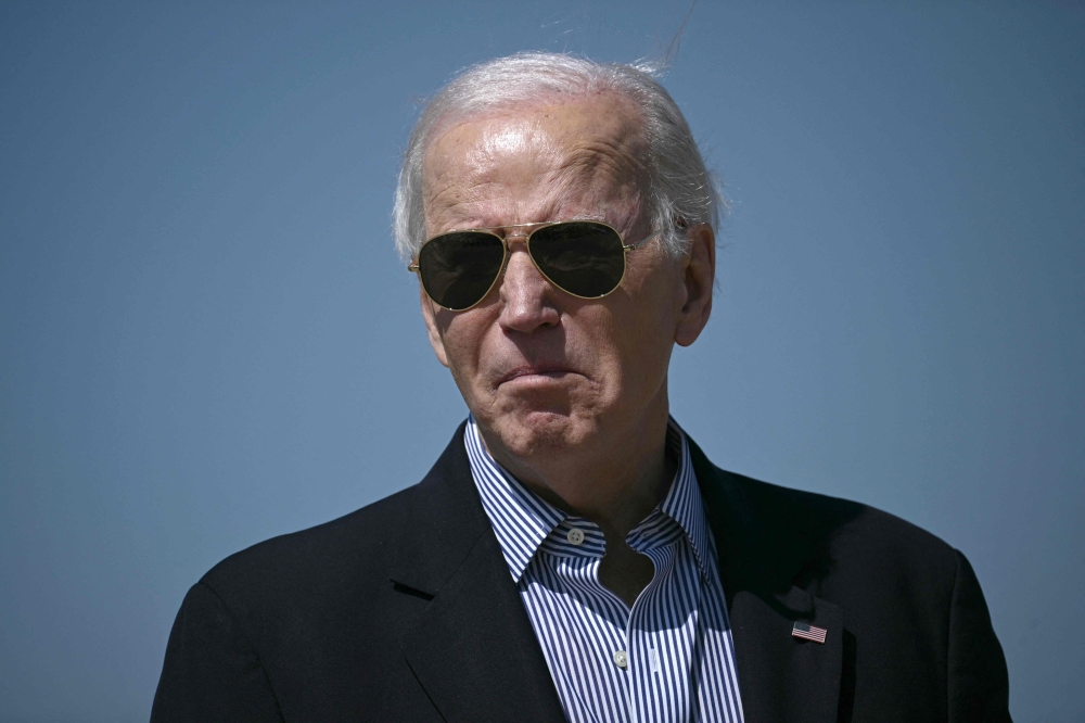 US President Joe Biden walks to board Air Force One at Joint Base Andrews, Maryland March 29, 2024. — AFP pic