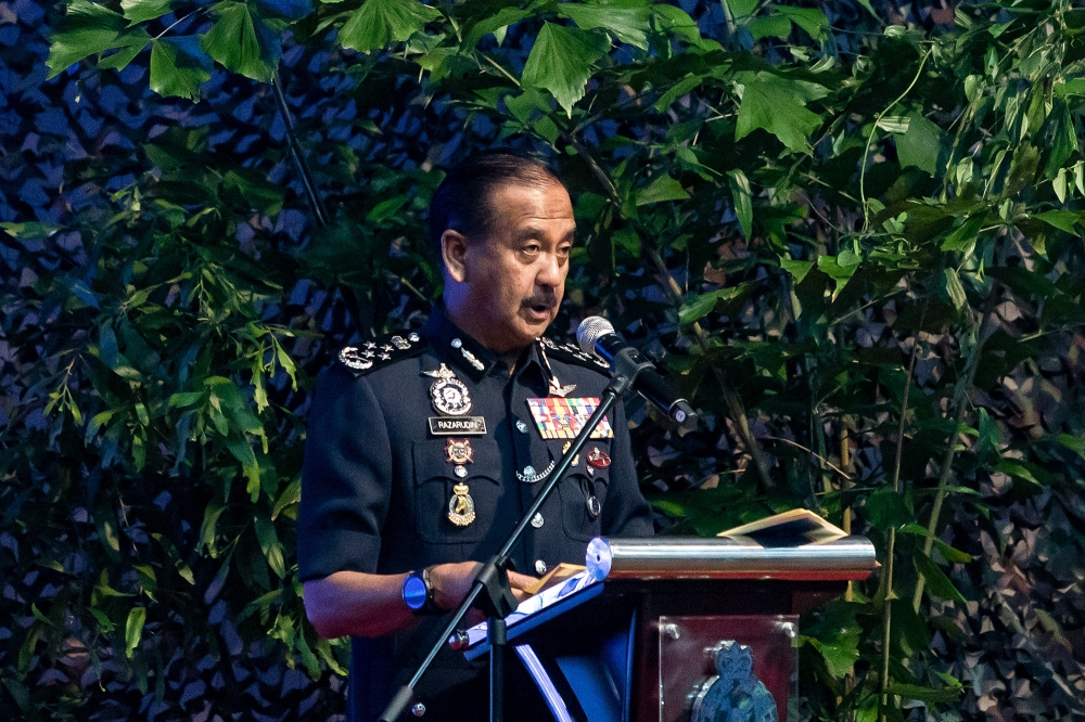 Inspector-General of Police Tan Sri Razarudin Husain said the man, arrested with a bag containing six handguns and 200 bullets, had arrived at Kuala Lumpur International Airport from the United Arab Emirates on March 12 using what authorities believed to be a fake French passport. — Picture by Firdaus Latif