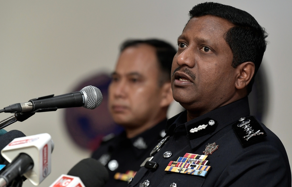 Selangor police chief Datuk Hussein Omar Khan at a press conference about the shooting of five suspected robbers in Putra Heights. — Bernama pic