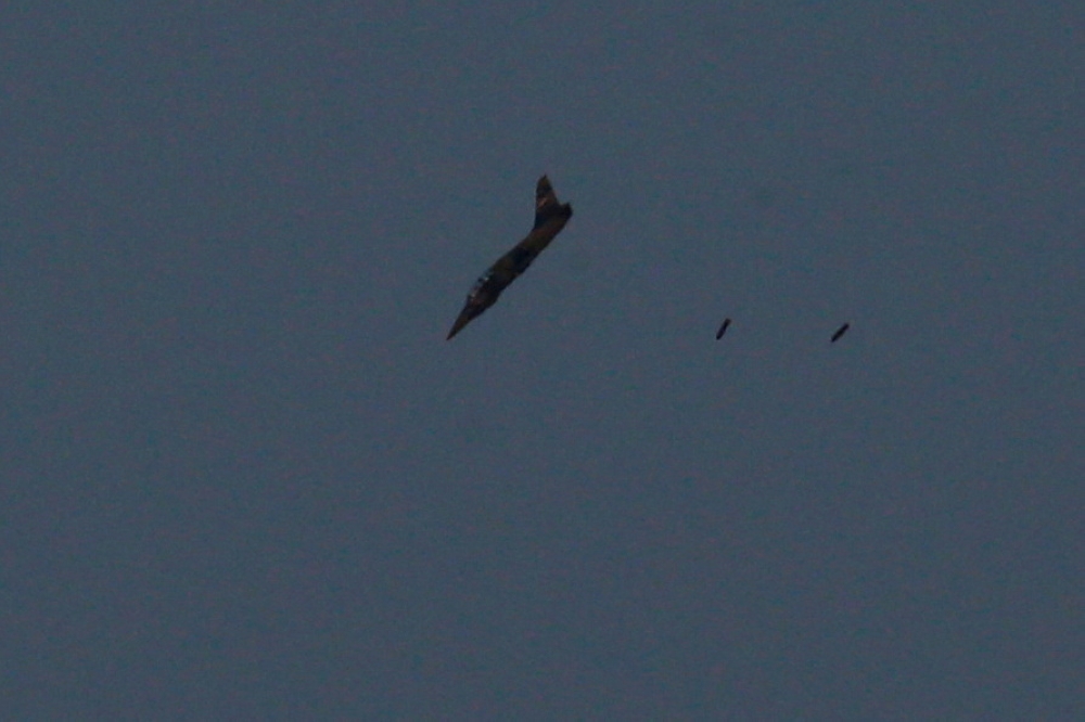 A warplane carries out a bombing run above Syria near the Israeli-Syrian border as it is seen from the Israeli-occupied Golan Heights July 24, 2018. — Reuters pic  
