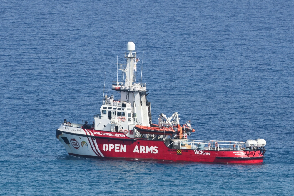 The Open Arms, a rescue vessel owned by a Spanish NGO, departs with humanitarian aid for Gaza from Larnaca, Cyprus March 30, 2024. — Reuters pic  