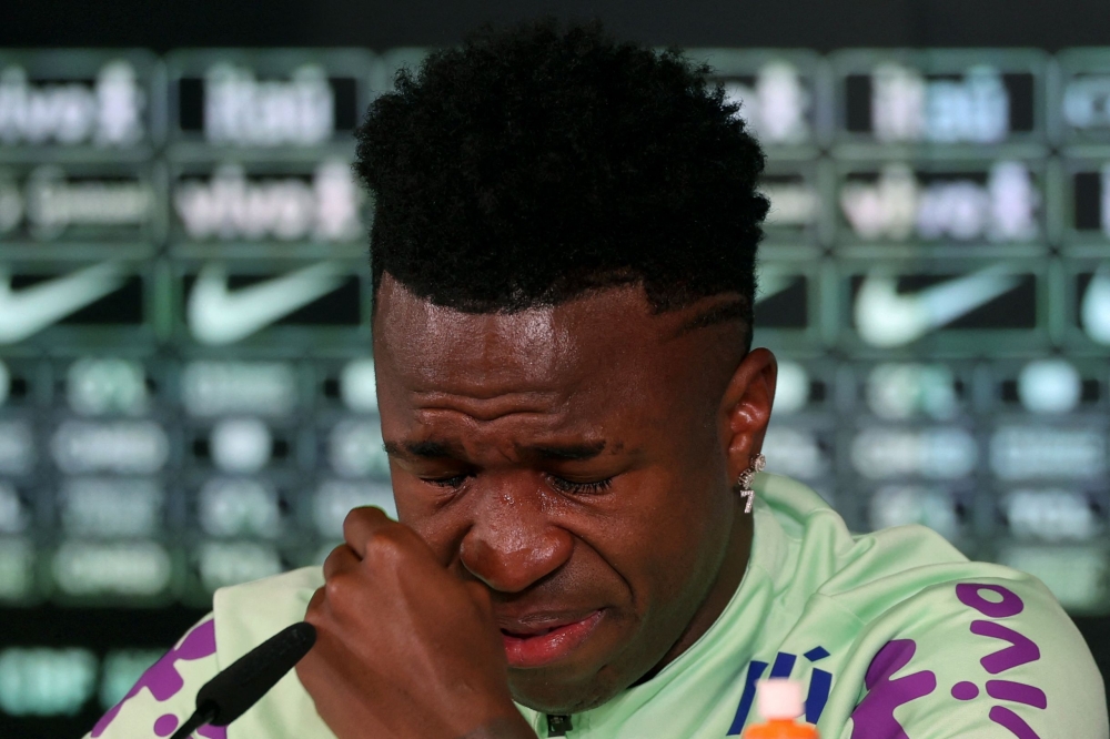 File photo of Brazil’s forward Vinicius Junior crying as he gives a press conference on the eve of the international friendly football match between Spain and Brazil at the Ciudad Real Madrid training ground in Valdebebas, outskirts of Madrid, on March 25, 2024. — AFP pic