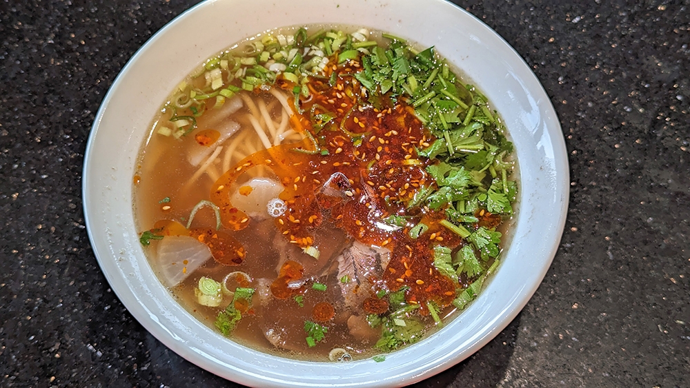 Despite the fiery red colour of the chilli oil, a bowl of Traditional Soup Beef Noodles is more on the mellow side.