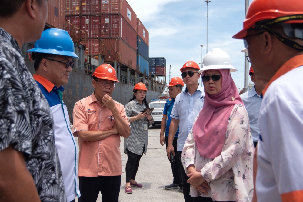 Minister in the Prime Minister’s Department (Federal Territories) Dr Zaliha Mustafa (right) listens to a briefing on Labuan Liberty Port by its operator Megah Port Management Sdn Bhd's director Datuk Seri Patrik Tiong (right) March 31, 2024. — Bernama pic