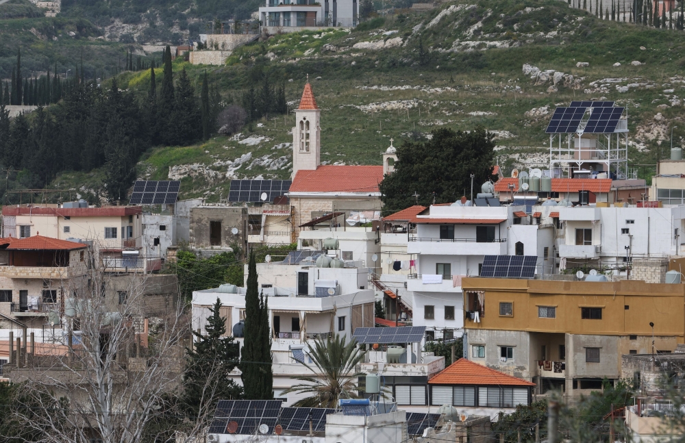 A view shows buildings and a church in el Qurayeh, southern Lebanon March 29, 2024. — Reuters pic