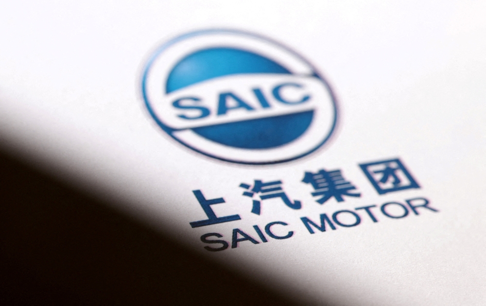China’s SAIC Motor aims to cut thousands of jobs this year at its joint ventures with General Motors and Volkswagen and at an electric-car unit. — Reuters pic